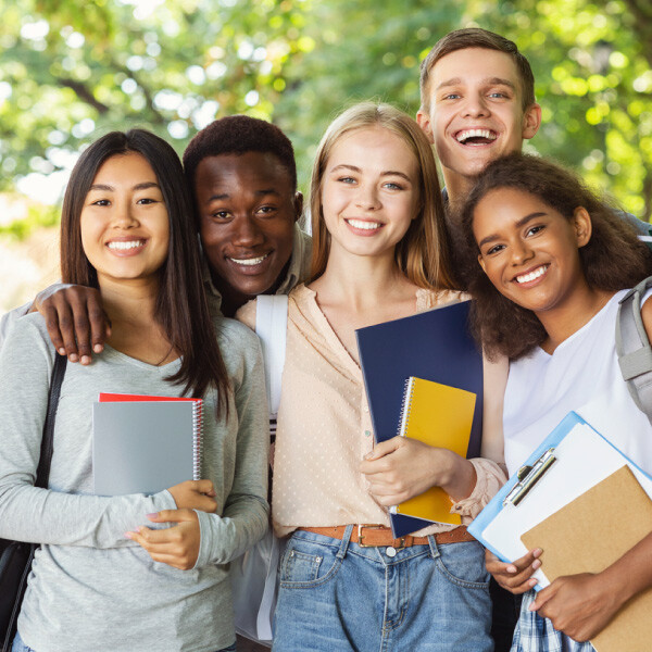 high school students standing and smiling