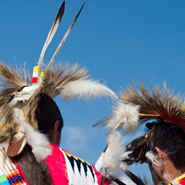 Two Native Americans in cultural dress